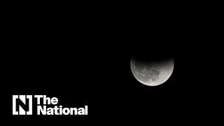 Washington stargazers see the longest partial lunar eclipse in centuries [upl. by Enylhsa718]