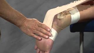 Protect a strained or sprained Achilles tendon with athletic taping [upl. by Hutner]