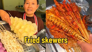 Check out Chengdu street food 10 skewers for one yuan and a drink is included [upl. by Howey]