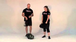 How to Properly Perform Ultimate Sandbag Training Power Clean [upl. by Atinnod]