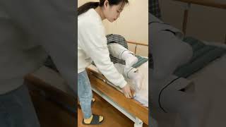 How to Use a Bedridden Patient Turning Pillow Professional Demonstration and Tips [upl. by Yenittirb]