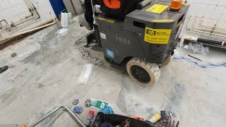 Removing kitchen screed flooring using NFE 5000 Sit on scraperfloor stripper [upl. by Akitnahs578]