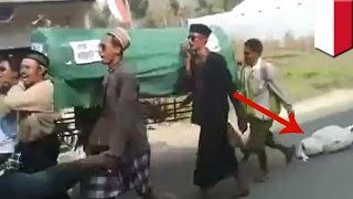 Funny funeral fail video Idiot pallbearers forget corpse during Indonesia funeral procession [upl. by Wickham617]