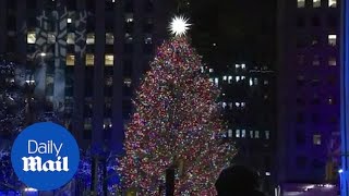 Watch the Rockefeller Center Christmas tree lighting in NYC [upl. by Akselaw539]