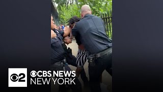 Video shows NYPD officers repeatedly punching man at Dominican Day Parade [upl. by Colan]