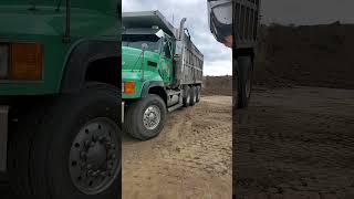 2003 Mack CL700 getting loaded with topsoil [upl. by Haymo179]