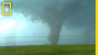 Tornadoes Lightning in Rare Video  National Geographic [upl. by Drarig]