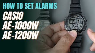 How To Set Alarms and Signal on Casio AE1000W and AE1200W World Time Illuminator  AE1000 AE1200 [upl. by Ynnej240]