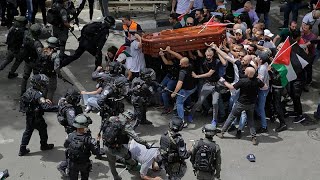 Israel police beat pallbearers at Al Jazeera journalistss funeral [upl. by Riatsila]