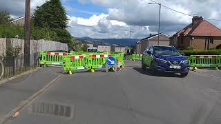 Roadworks Limiting road space Leaving Home Bargains Whins of Milton Stirling Scotland UK [upl. by Ajaj]