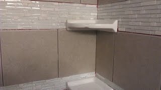 DIY shower tiling Installing floating corner shelves [upl. by Kellsie]