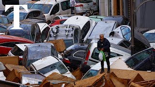 Valencia flood Drone footage reveals car graveyard as Spain announces new aid measures [upl. by Germin478]