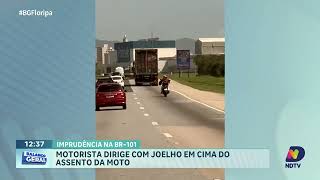 Imprudência na BR101 motoqueiro dirige com o joelho em cima do assento [upl. by Llezom324]