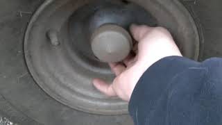 Removing hardened rubber caps from your lawn tractor [upl. by Innavoj]