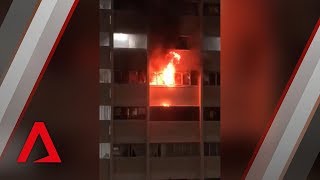 Fire breaks out at Hougang flat in Singapore [upl. by Mctyre]