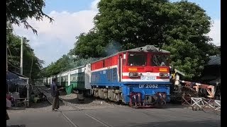 Myanmar Railways Burma a passenger train at a busy crossing having exiting Mandalay Station [upl. by Broddie]