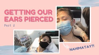 GETTING OUR EARS PIERCED PART 2  PIERCINGS BY RAVANA  Laurie Dimayuga [upl. by Oinegue]