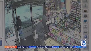 Deputy walks in on attempted robbery at California 7Eleven [upl. by Lashar160]