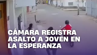 Cámara de seguridad registra asalto a joven [upl. by Pegasus118]