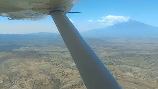 Landing in Arusha Airport Tanzania 🇹🇿 on a Flightlink Air Cessna 208 Caravan aircraft [upl. by Nolana]