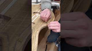 woodworking carving bassguitar body contours on this 6 string bass luthier guitar handtools [upl. by Anawik]