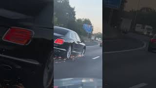 Insane moment Bentley drives down motorway without a front tyre [upl. by Nairam]