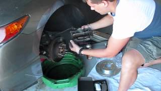 How to replace brake pads and rotors on Honda Civic 2007 part 1 [upl. by Atteras]