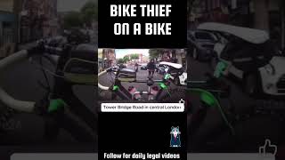 Bike thief tries to steal bike while moving in traffic London [upl. by Eduard]