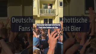 Deutscher Fan versorgt Schotten vom Balkon mit Bier  shorts [upl. by Eelimaj]