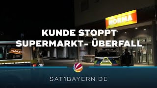 AxtÜberfall in Neumarkter Supermarkt Kunde stoppt Täter [upl. by Anirahc]