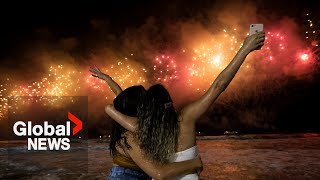 New Years 2023 Copacabana beach sizzles in Rio de Janeiro as fireworks illuminate night sky [upl. by Gabriel131]