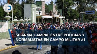 Manifestantes por caso Ayotzinapa se enfrentan a policías en el Campo Militar 1 [upl. by December]