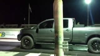 Nissan Titan vs Nitrous F150 [upl. by Nwahsear]