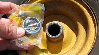 HOW TO REPLACE INSTALL WHEEL BEARINGS RIDING LAWNMOWER JOHN DEERE [upl. by Broderick842]