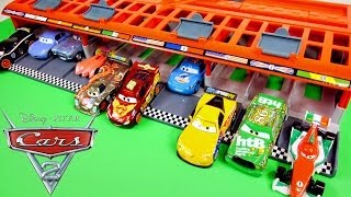 CARS 2 World Grand Prix 10 Car Race Launcher Hot Wheels Toys Disney Pixar Cars Carrying Case [upl. by Aland]