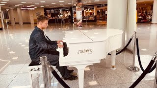 Street piano amazing pianist at the airport Mallorca  watch until the end [upl. by Kcirddahc654]