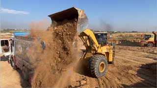 Caterpillar 966F Wheel Loader Digging And Loading Dump Trucks [upl. by Leiva639]