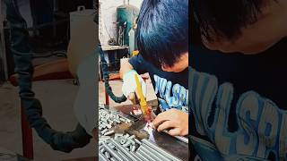 Workers weld hardware and steel pipe fittings with spot welding [upl. by Rennane]