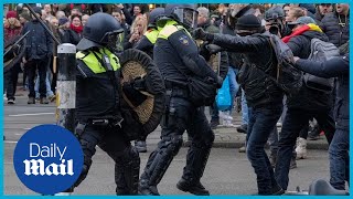 Protests in Europe Police in Amsterdam clash with antilockdown protesters [upl. by Ettenot]