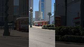 A streetcar rolls down Canal St in French Quarter in New Orleans neworleans streetcar trolley [upl. by Berthoud]