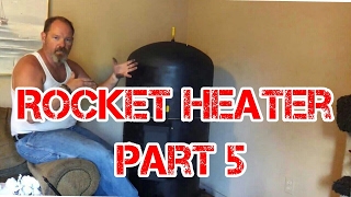 Rocket Heater Wood Stove Installation Part 5 The First Burn Indoors [upl. by Yelnats866]