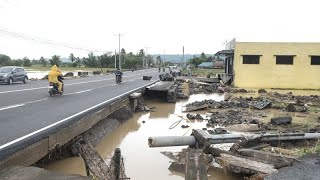 Filippine tempesta tropicale e inondazioni la gente aspetta i soccorsi sui tetti delle case [upl. by Whitaker354]