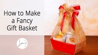 Creating a Gift Basket with a Festive Ribbon Bow giftwrapping giftbasket [upl. by Ruelu]