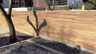 Modern slatted fence with extra narrow slats Constructed in Ipe hardwood [upl. by Shifrah689]