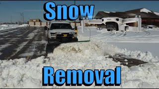 Plowing Snow in Parking Lot with Chevy Silverado and SnowEx Plow LBZ DURAMAX [upl. by Sirtimid]