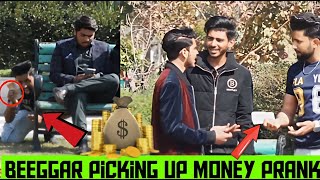 Beggar picking up Money with a twist prank [upl. by Ennylhsa]