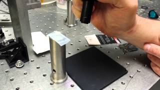 KMLabs Inc RampD Femtosecond Ultrafast Fiber laser pen cutting glass [upl. by Nafets142]