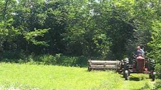 Mowing hay with the IH SMTA and 990 haybine [upl. by Lacym]