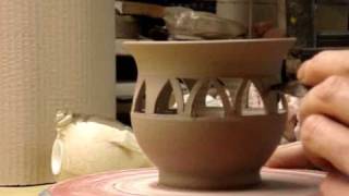 Piercing a pottery clay bowl pierced potters wheel throwing [upl. by Ia827]