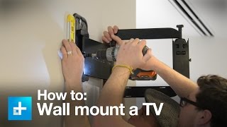 How to wall mount a TV with the Sanus full motion VMF322B1 [upl. by Kryska]